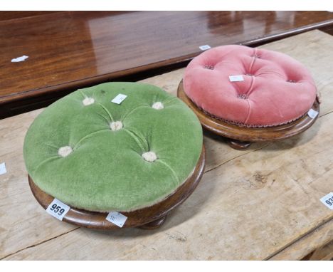 A PAIR OF ROSEWOOD CIRCULAR FOOTSTOOLS, ONE BUTTON UPHOLSTERED IN GREEN VELVET AND THE OTHER IN PINK