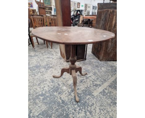 A 19th C. MAHOGANY TRIPOD TABLE, THE CIRCULAR TOP ON A BALUSTER COLUMN.   Dia. 83 x H74cms.
