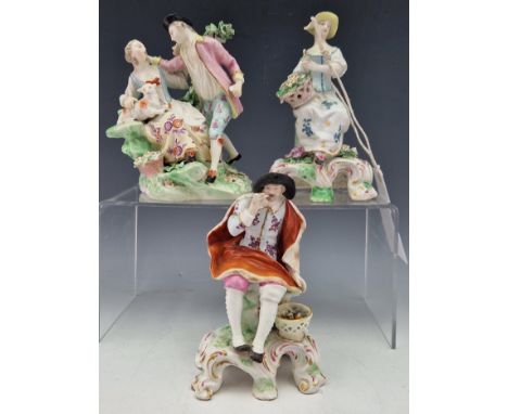 A PAIR OF PATCH MARK DERBY FIGURES SEATED ON FOOTED BASES, SHE REPRESENTING SUMMER AND HE WINTER.   H 14cms. TOGETHER WITH A 