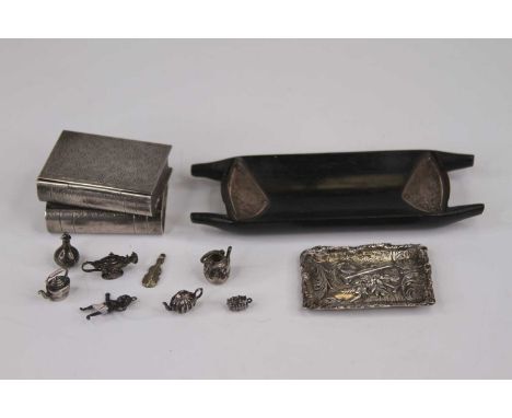 A 20th century Chinese white metal table snuff box in the form of two books; together with a late Victorian ebonised and silv