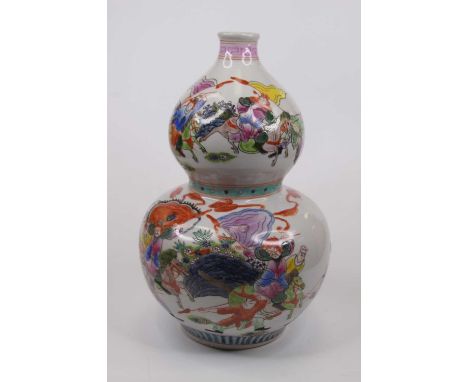 A Chinese double gourd porcelain vase, enamel decorated with warriors and trees, height 34cm