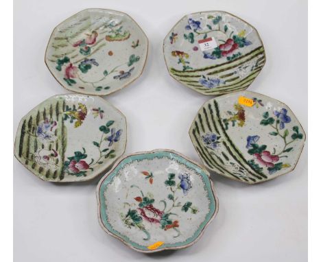 Five Chinese pottery plates, each enamel decorated with flowers