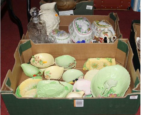 Two boxes of glass and ceramics to include a Murano glass clown and Carlton ware leaf dishes
