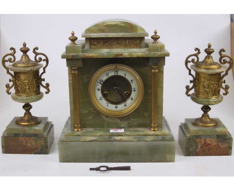 A green onyx three piece clock garniture in the neo-classical style, the clock having an enamel chapter ring with Arabic nume