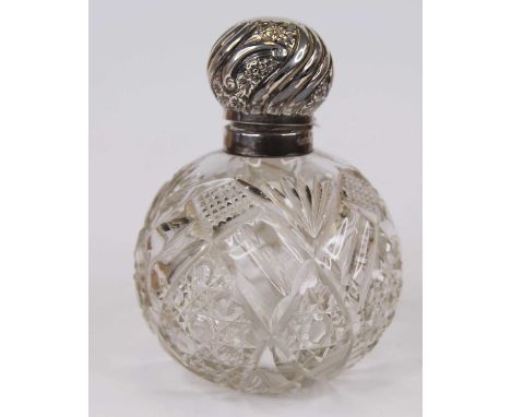 An Edwardian cut glass and silver lidded scent bottle, Sheffield 1901Light chips throughout.Minor dents to the lid.