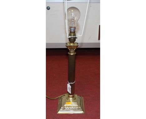 A brass Corinthian column table lamp with shade, h.60cm (including shade)