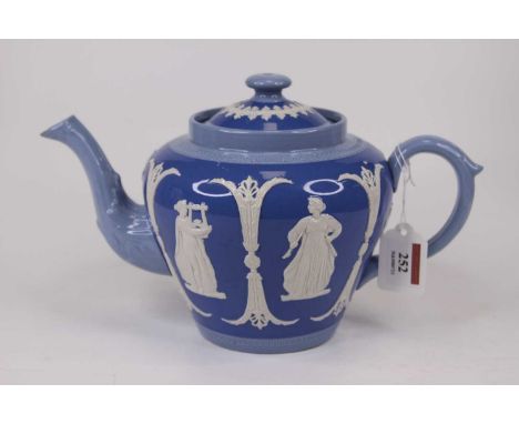 A Dudson Brothers blue glazed teapot, relief decorated with classical figures