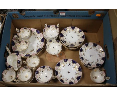 A Victorian tea and coffee serviceVery worn and stained throughout.One cup is cracked and another has a repaired handle.