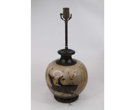 A Chinese pottery table lamp, of bulbous form, decorated with deer, h.52cm (including fittings)