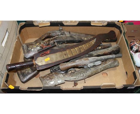 A collection of reproduction flintlock pistols, together with an African dagger