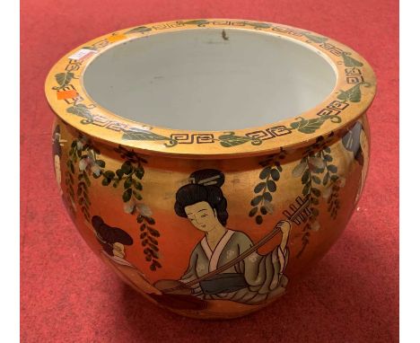 A Chinese pottery jardiniere, decorated with figures on a gilt ground, h. 30cm
