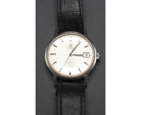 A gent's Omega steel cased vintage wristwatch, having a signed silvered dial, baton markers, data aperture, and automatic mov