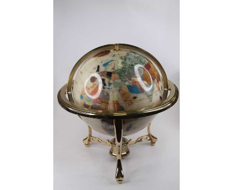 A lacquered hardstone inset terrestrial table globe, on a brass stand, h.47cm 