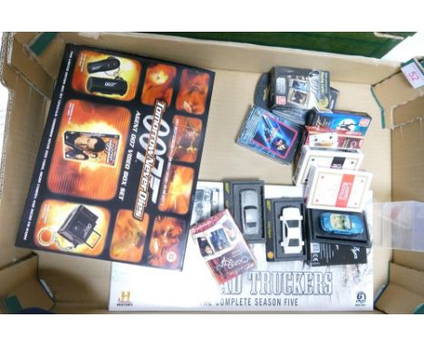 A mixed collection of James Bond 007 items to include Playing Card Sets, Agent 007 Video Box Set, miniature cars together wit