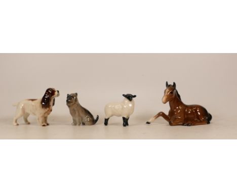 Four Ceramic Animal Figures to include Springer Spaniel 1754, Black Faced Lamb 1828, Brown Sitting Foal 915 and a Royal Doult