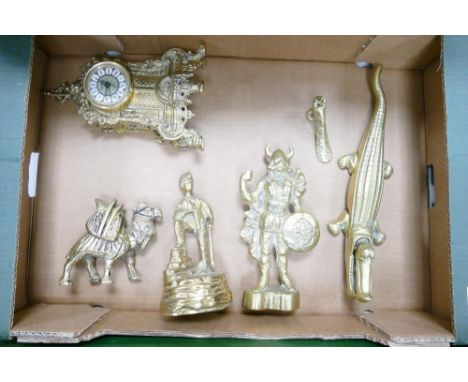A collection of brass ware to include decorative mantle clock, ornaments, nut cracker etc 