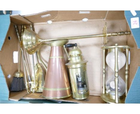 A collection of brass ware to include fireside set, sandglass timer, gas lamp etc 