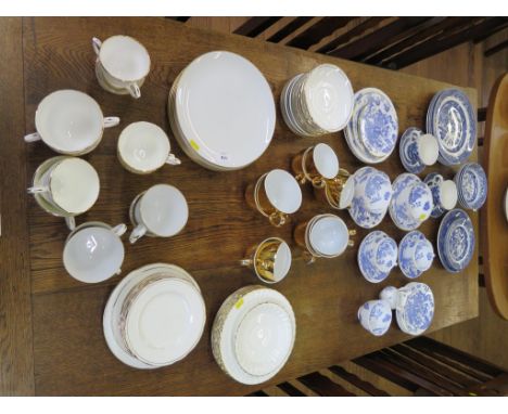 Various Royal Worcester gilt tea wares and dinner wares, Duchess Ascot pattern tea wares, Royal Worcester dragon pattern brea