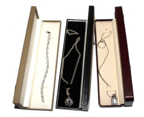 Two 925 silver necklaces with pendants and a 925 silver bangle, all with boxes 