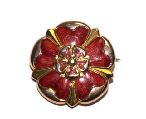 A 9 carat gold and red enamel brooch in the form of a rose 