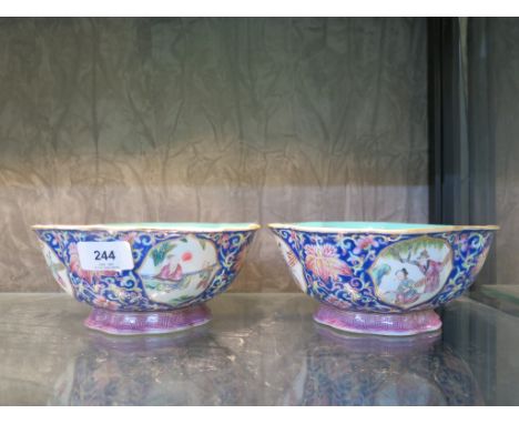 A pair of Chinese famille rose lotus shaped bowls, each with floral scroll blue ground and figural panels, turquoise interior