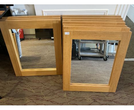 Ten light oak wall mirrors- LOT SUBJECT TO VAT ON THE HAMMER PRICE - To be collected by appointment from The Ambassador Hotel