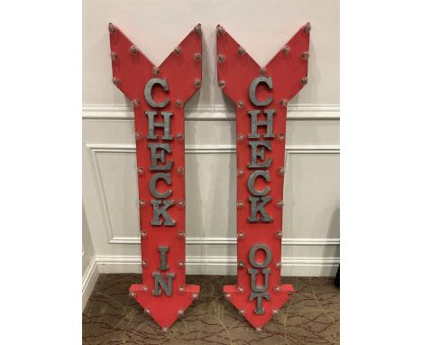 Two painted metal check in, check out, light up signsDimensions: Height: 125cm  Length/Width: 30cm  Depth/Diameter: 7cm
