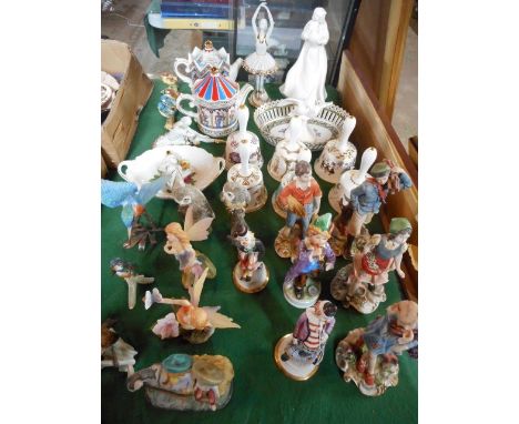 A large quantity of decorative ceramics and other items to include: two Sadler teapots, six Hammersley ceramic bells, various