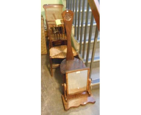 A Victorian toilet mirror, a cane rocking chair, rush seated hall chair, spinning chair, together with an oak stool.