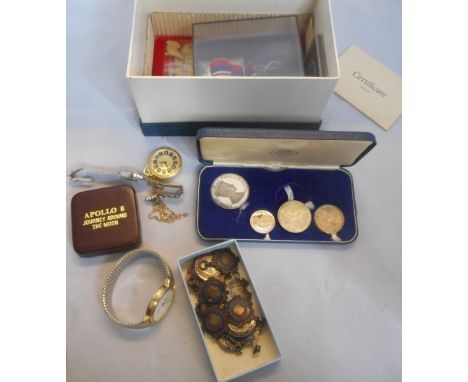 A gentleman's quartz wristwatch, two lady's wrist watches and a fob watch on a yellow metal chain.  A 1939/45 War medal, two 