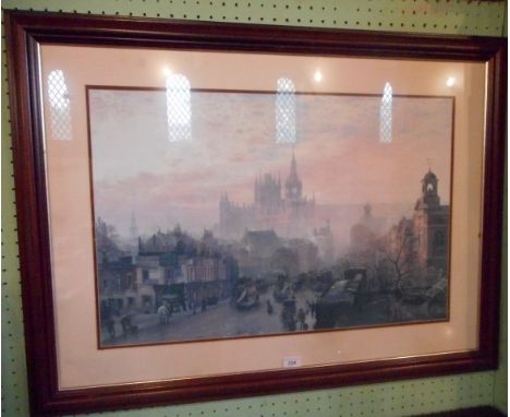 A framed and glazed print of high street, Islington, in the early 20th century, with St Pancras station in the background, 49