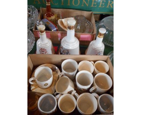 Four Bell Scotch Whisky decanters with partial contents, together with a quantity of Royal Commemorative China and glass.