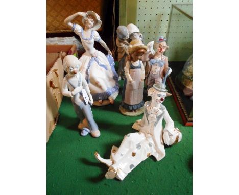 A collection of six ceramic figures, to include Nao, comprising three clowns, one lady, one girl in a hat and two children wi