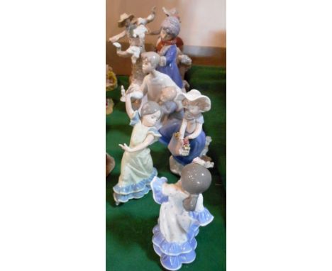 A collection of six Lladro figurines, to include: 'A Girl with a Scarecrow', numbered 5385, 'Winter Frost', numbered 5287 and