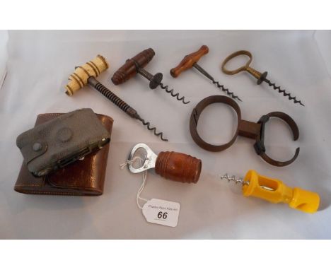A collection of 19th century and later corkscrews, together with a treen handled bottle opener and an Ensign midget Lucos E10