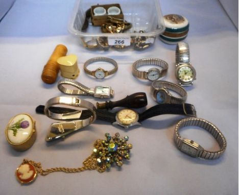 A quantity of lady's and gentleman's wristwatches, various makers, together with a patch box, a glass scent bottle contained 
