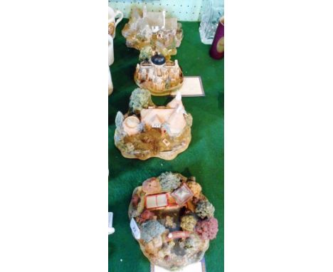 A collection of four Lilliput Lane model cottages, to include: 'Reflections of Jade', limited edition of 3950 (with deed cert