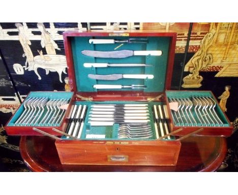 A canteen of cutlery of possible military relevance with two fold-out cantilever trays and drawer under, Lieutenant H A P How
