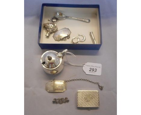 A small collection of silver items, to include an engine turned vesta case, a mustard pot with blue glass liner, two spirit d