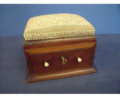 19th C mahogany sewing box with needlework upholstered top and single drawer, with turned ivory finial handles, on step base 