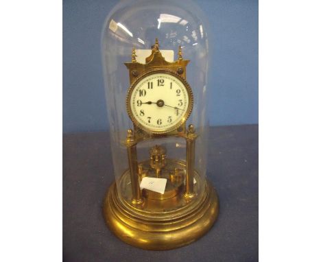 400 day brass clock with white enamel dial under glass dome (30cm high) 