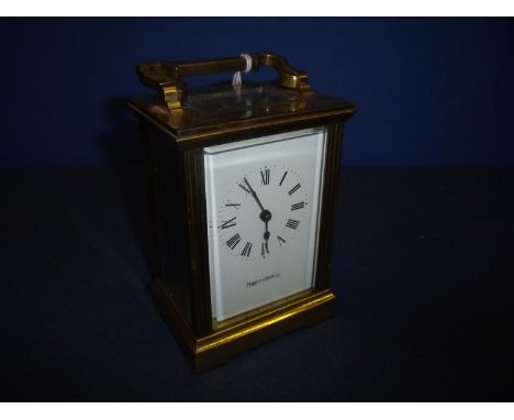 20th C brass cased carriage clock white enamel dial, lever platform escapement, retailed by Mapping and Webb Ltd with movemen