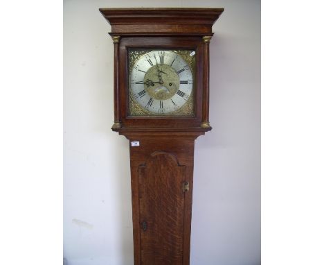 Jones of Wrexham brass and steel faced eight day oak cased long case clock, with date dial to the face 