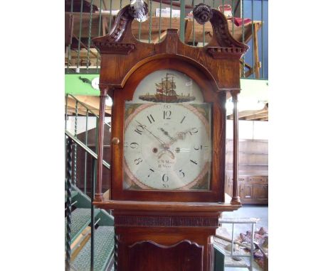 Stained pine cased 8 day long case clock with arched panted dial, with date and minute secondary dials marked SM Master B. Me