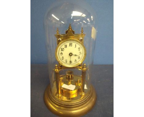 400 day brass clock with enamel dial under glass dome (33cm high) 