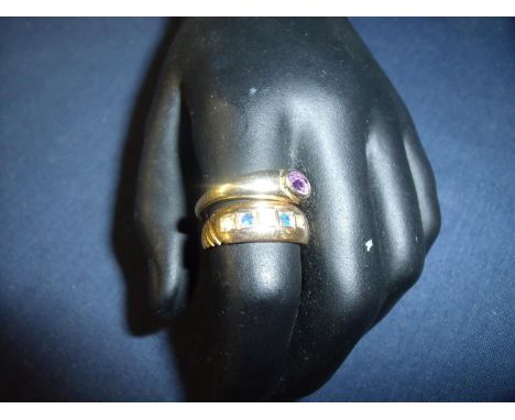 15ct gold rub over gypsy style ring set with seed pearls &amp; sapphires and a similar rub over ring with amethyst type stone