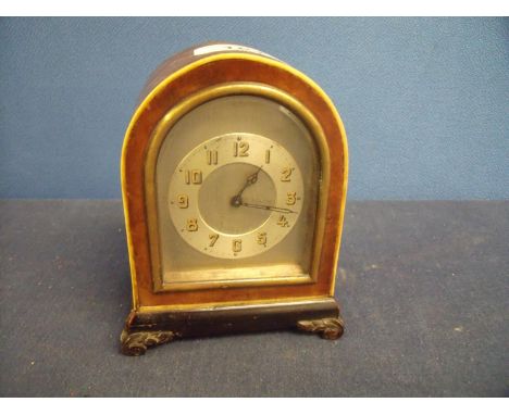 19th/20th C walnut wind-up arch top clock with boxwood inlay and stepped ebonised base (9.5cm x 6cm x 12cm) 
