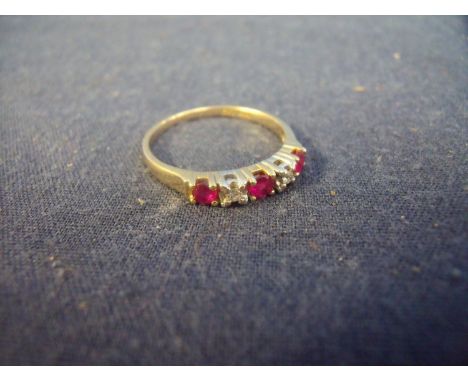 14ct gold five stone cubic zirconia and ruby ring 