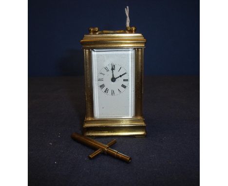 Early 20th C miniature brass carriage clock, white enamel dial, platform escapement and movement stamped with makers mark ACG
