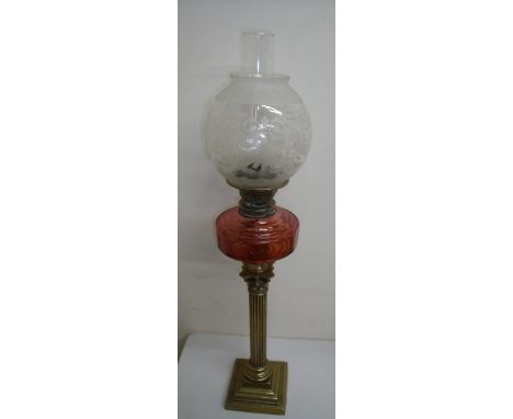 Brass Corinthian column oil lamp with red glass reservoir and etched shade (80cm high) 